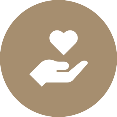 A hand holding a heart with the word love above it.