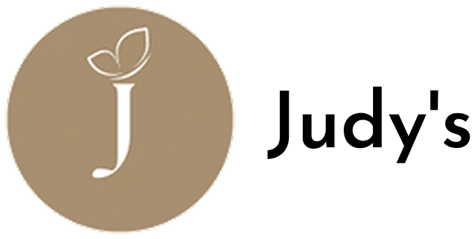 A brown circle with the letter j in it.